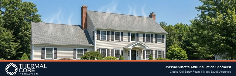 Thermal Core Insulation article cover image featuring a classic two-story New England colonial home in Massachusetts surrounded by lush summer trees and blue sky, with visible heat waves rising from the roof illustrating attic heat buildup. Navy blue banner at the bottom displays the Thermal Core Insulation logo with the text "Massachusetts Attic Insulation Specialist — Closed-Cell Spray Foam | Mass Save® Approved."